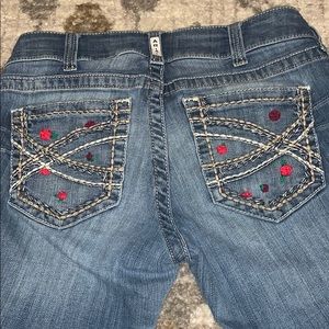 rose embroidered bootcut ariat jeans
